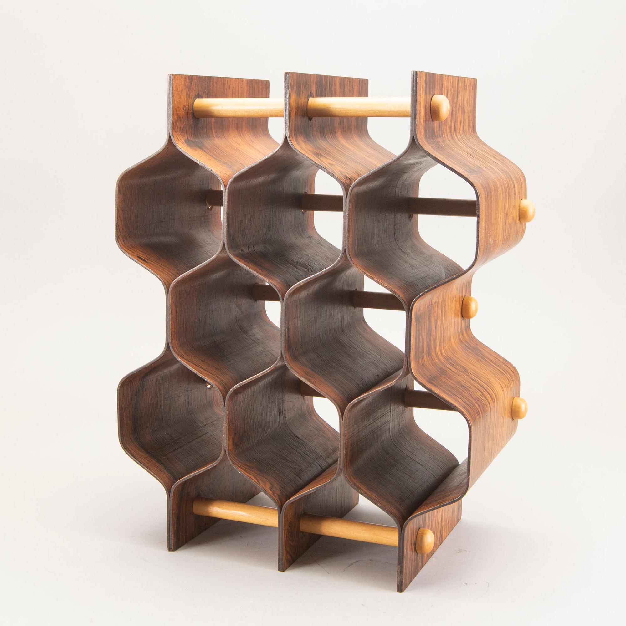 A Torsten johansson jacaranda wine stand for AB Formträ Värnamo 1965.