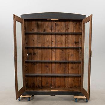 Display cabinet circa 1900.