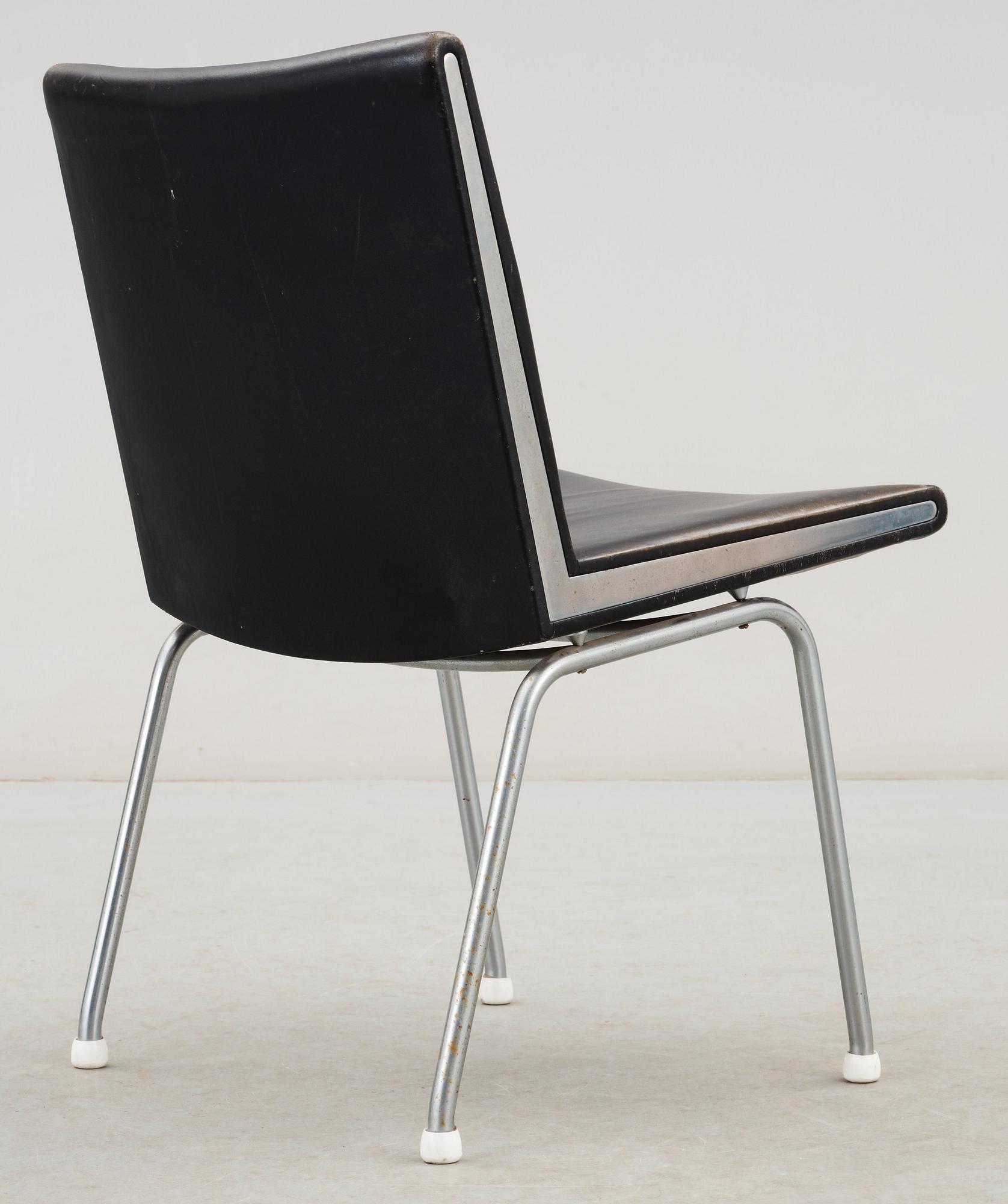 A Hans J Wegner 'Kastrup' steel and black leather chair, AP-stolen, Denmark.