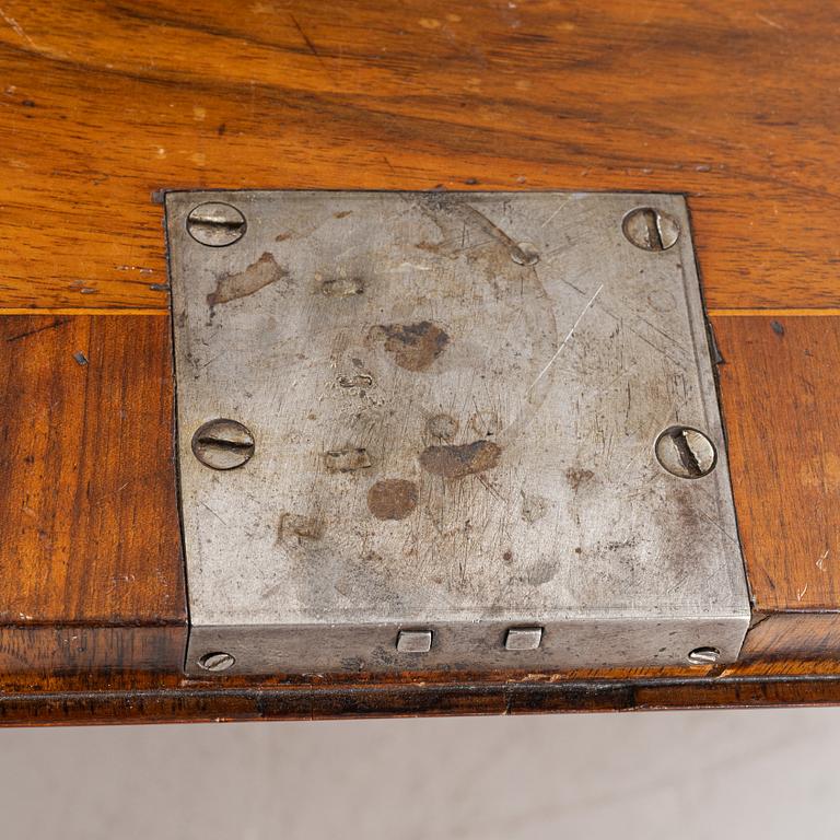 A rococo walnut-veneered and gilt-brass mounted secretaire, later part of the 18th century.