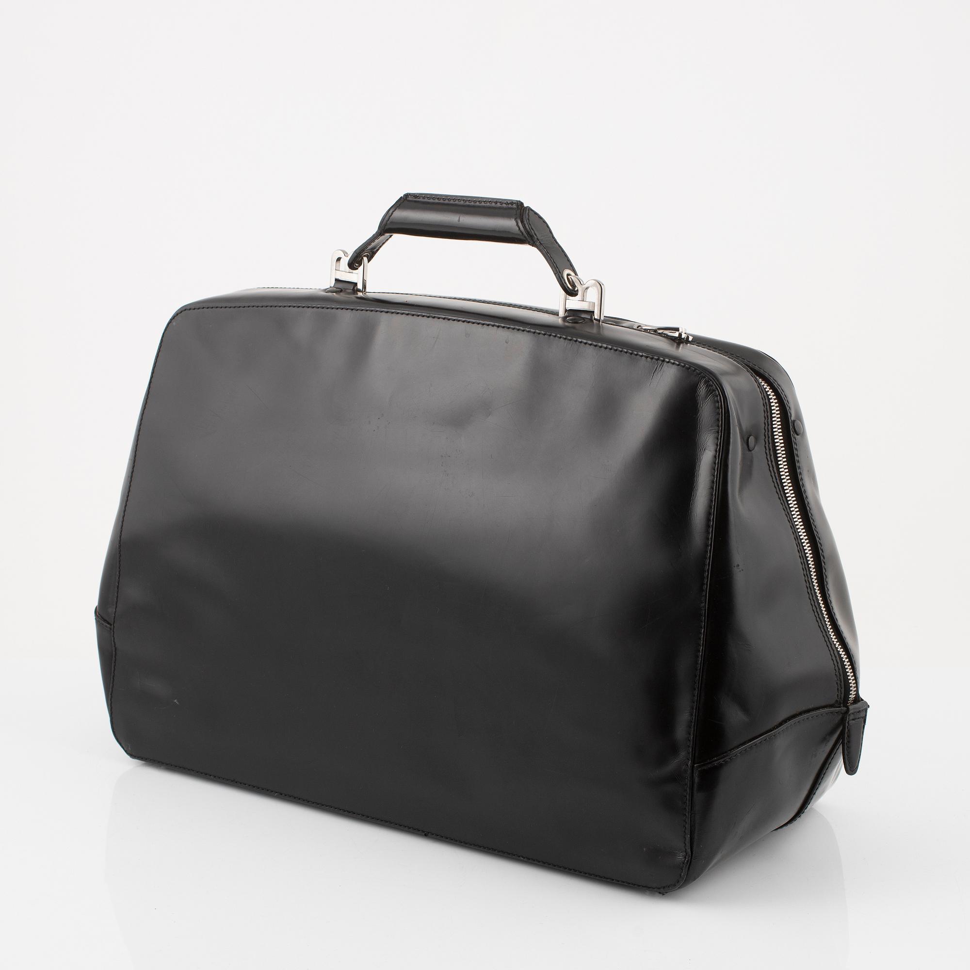 Bally, a black leather bag.