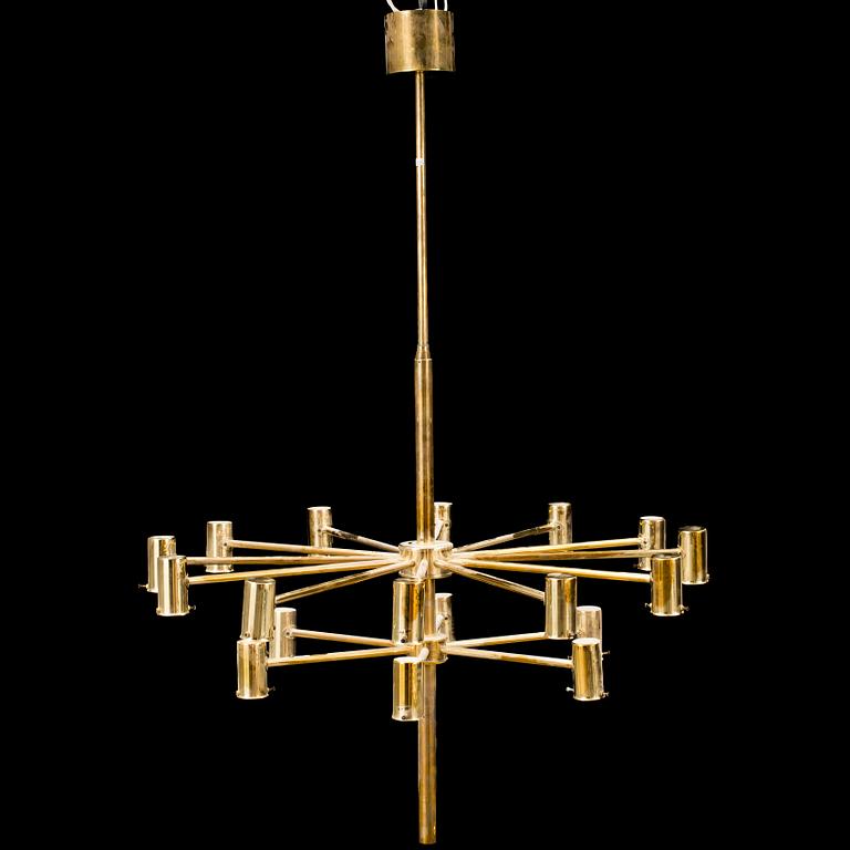 A 20th century brass and smoked glass chandelier by Hans Agne Jakobsson, Markaryd, Sweden.