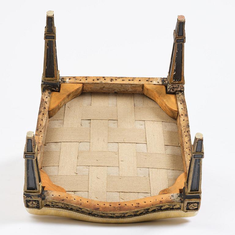 A French Louis XVI chair, late 18th century.