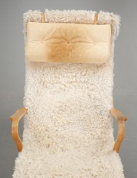 LIGGFÅTÖLJ, "Pernilla", brännmärkt Bruno Mathsson design.