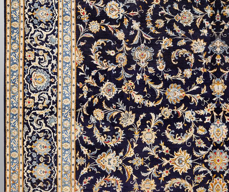 A Keshan carpet, c. 450 x 322 cm.