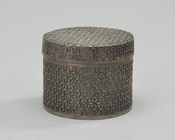 An Estrid Ericson trellice pattern pewter box by Svenskt Tenn.
