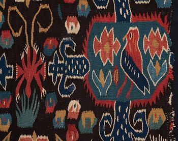 An 18th century carriage cushion, "Den innelykta fågeln", tapestry weave,  ca 52 x 67 cm, Scania (Sweden).