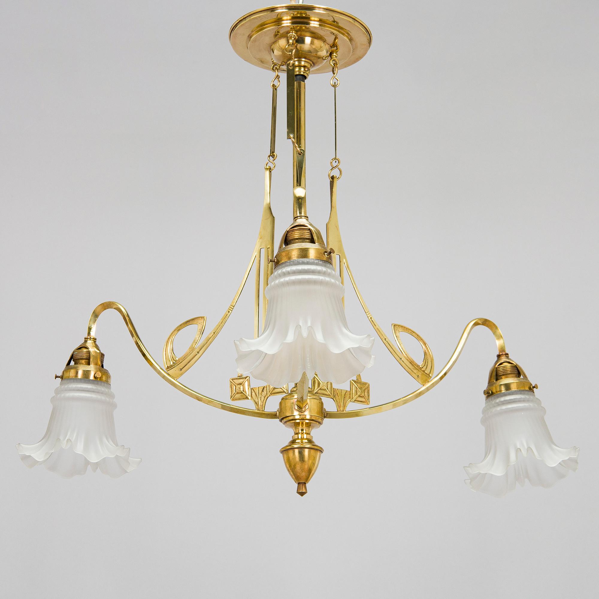 Kattovalaisin, 1900-luvun alku.