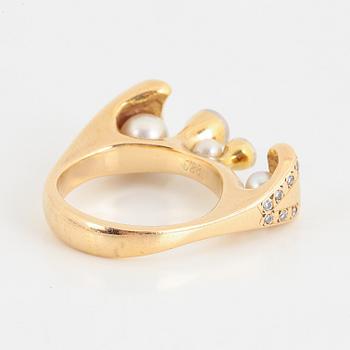 Brilliant-cut diamond and pearl ring.