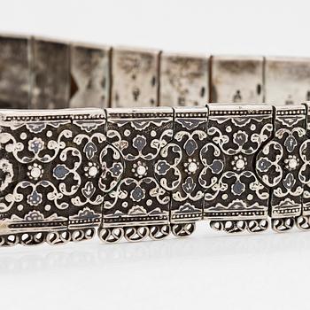 A Caucasian silver and leather belt with niello, early 20th century.
