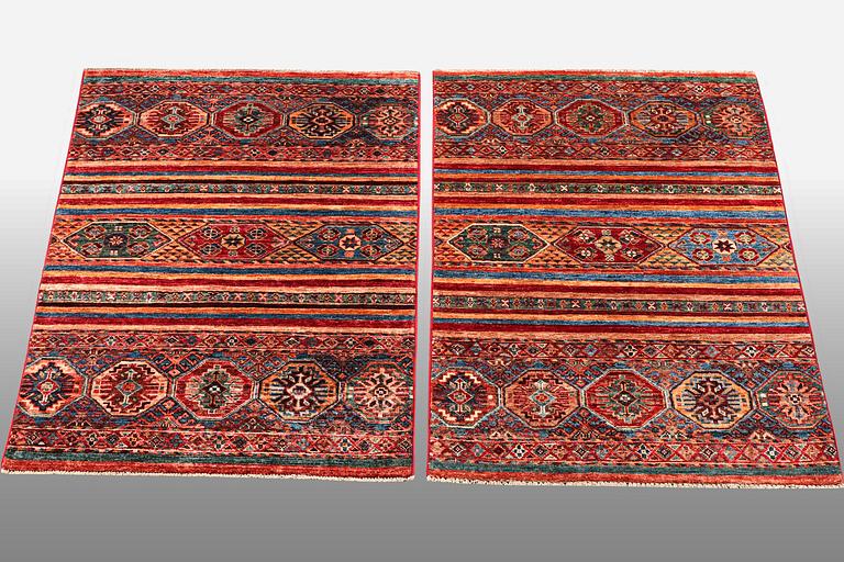 A pair of rugs, Khorjin, ca 128 x 82 cm & ca 123 x 84 cm.