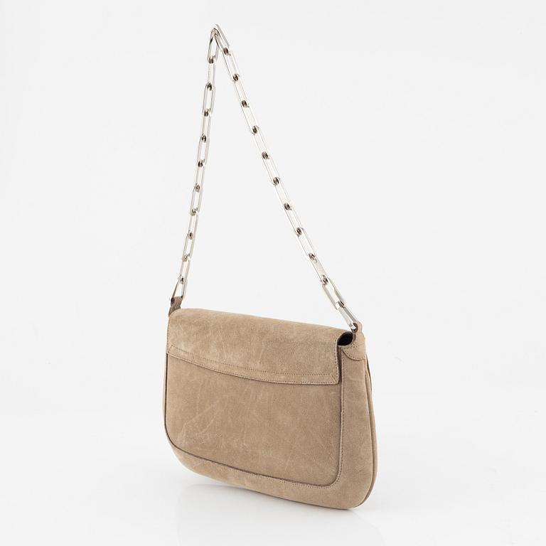 Gucci, a suede handbag.