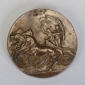 A bronze participant medal from the 1912 olympic games in Stockholm.