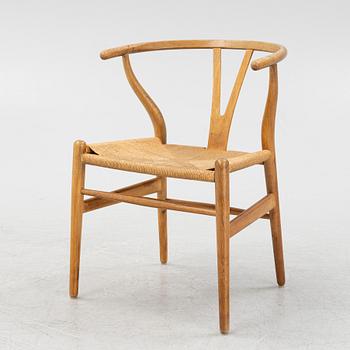 Hans J Wegner, a model 'CH 24' beech chair, Carl Hansen & Son, Odense, Denmark.