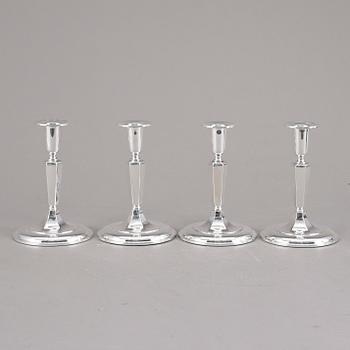 LJUSSTAKAR, 4st snarlika, silver, K&EC, Göteborg, 1956.