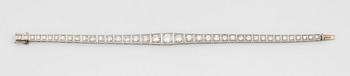 A platinum bracelet set with round brilliant-cut diamonds with a total weight of ca 3.75 cts.