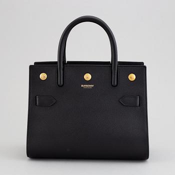 Burberry, a black leather 'Baby Title' handbag, 2019.