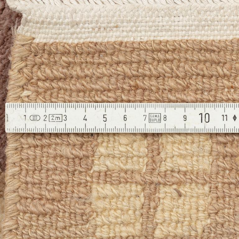 A carpet, Tibet, c. 245 x 357 cm.