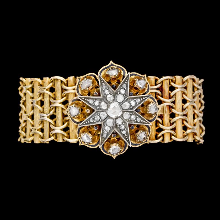 ARMBAND, guld med ornament med rosenslipade diamanter samt svart emaljarbete, 1800-talets andra hälft.