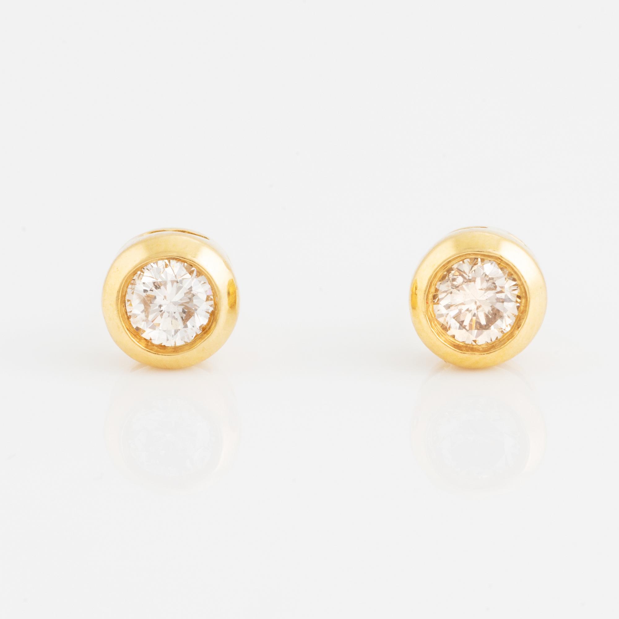 Brilliant cut diamond earrings, total ca 0,50 ct.
