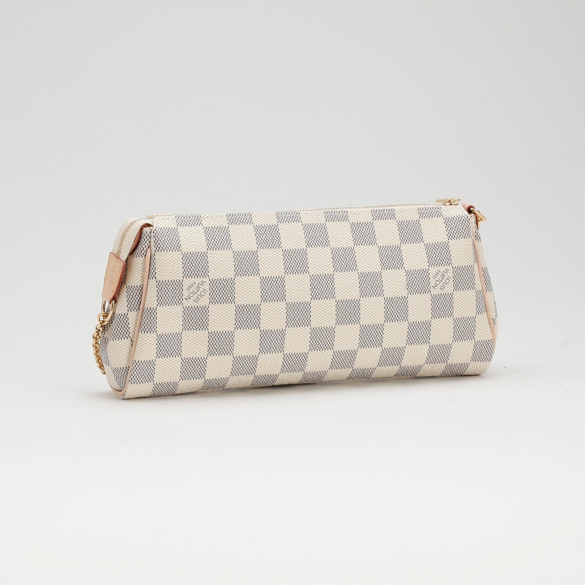 LOUIS VUITTON a damier azur Eva clutch shoulder and evening bag with an extra leather strap. Bukowskis