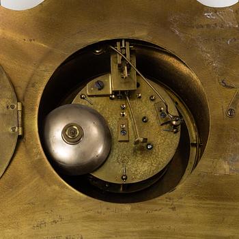 A first half of the 20th century brass wall clock.