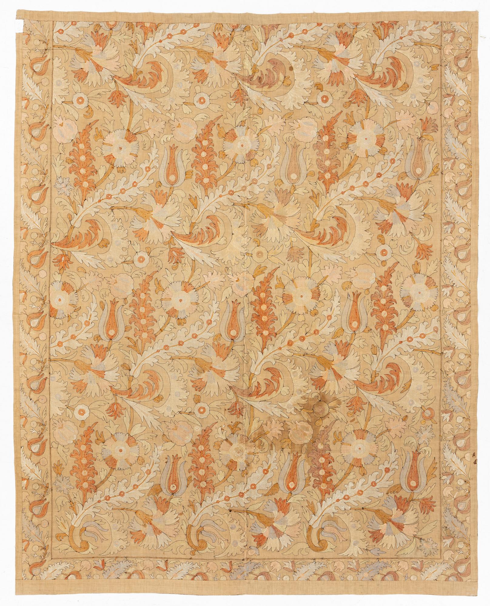 An embroidery, likely an antique Uzbekistan suzani, ca 226.5-230.5 x 180-182 cm.