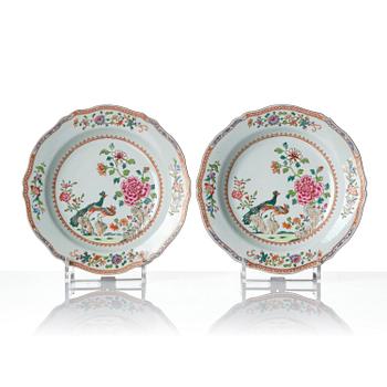 A set of six famille rose 'double peacock' soup dishes, Qing dynasty, Qianlong (1736-95).