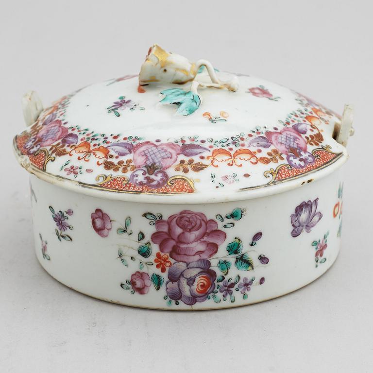 A famille rose butter tureen with cover and two cups with three odd stands, Qing dynasty, Qianlong (1736-95).