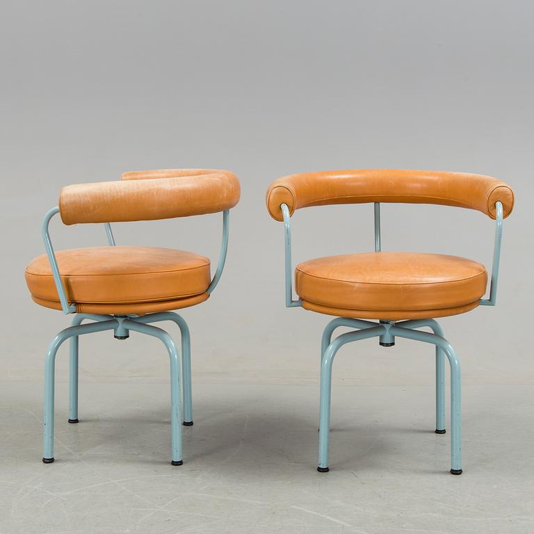 A set of four "LC7" chairs by Le Corbusier, Pierre Jeanneret and Charlotte Perriand for Cassina.