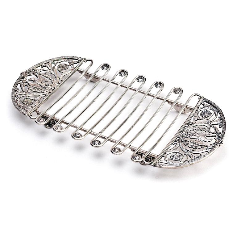 A silver asparagus cradle by W.A. Bolin, Moscow 1912-17.