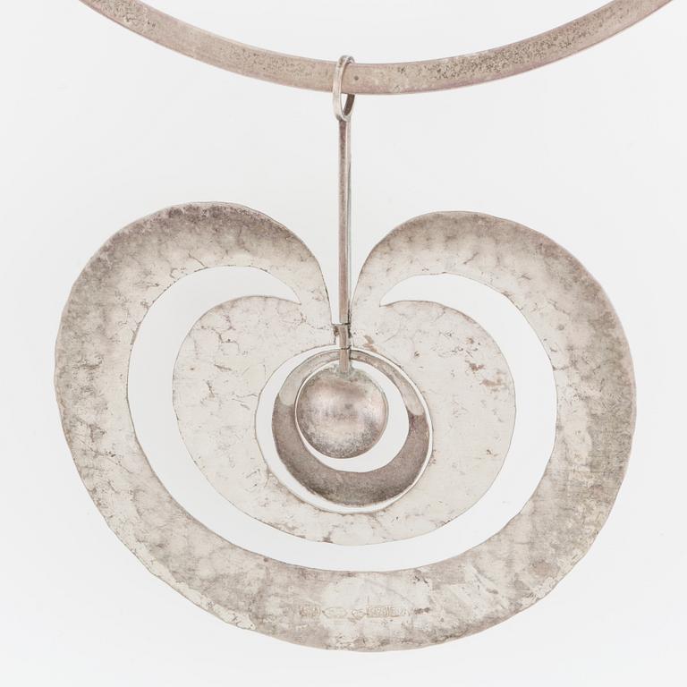 TAPIO WIRKKALA, a sterling silver pendant 'Omena', Finland, 1975.