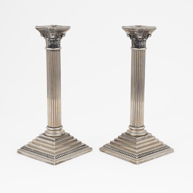 A pair of silver plate Godinger Silver candle holders, 1992.