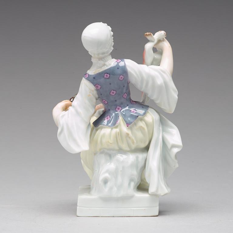 FIGURIN, porslin. "Tillredning av hare". Meissen, 1800-talets andra hälft.