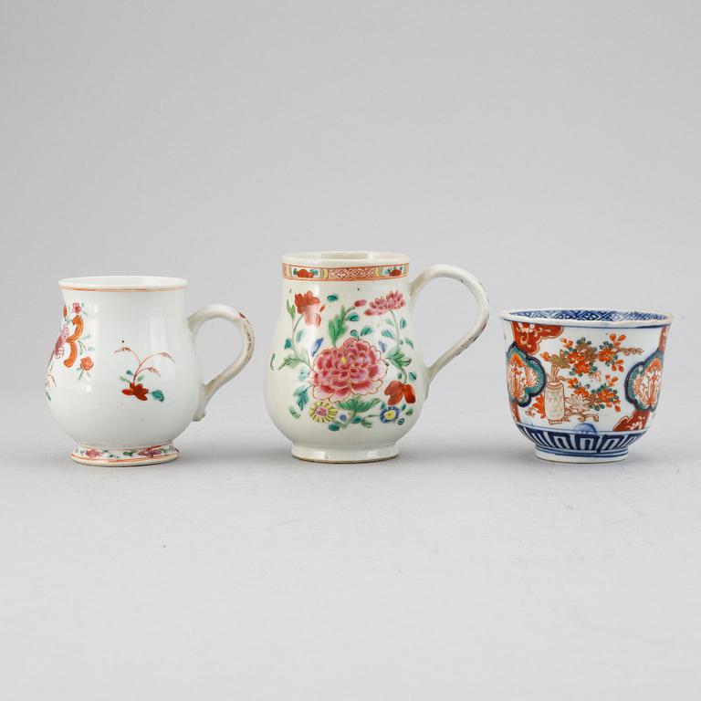 Two famille rose export porcelain jugs and a Japanese Imari bowl, Qing dynasty, Qianlong and Meiji.