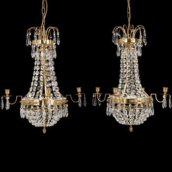 A pair of gustavian style chandeliers, second half of the 20th century.