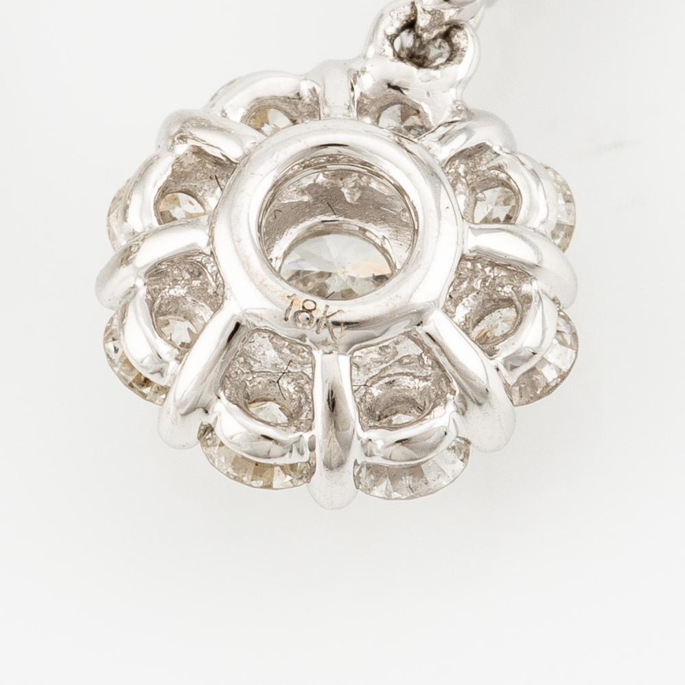 Earrings, a pair, 18K white gold with brilliant-cut diamonds.