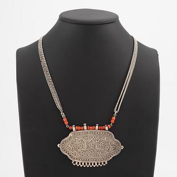 Silver and coral necklace.