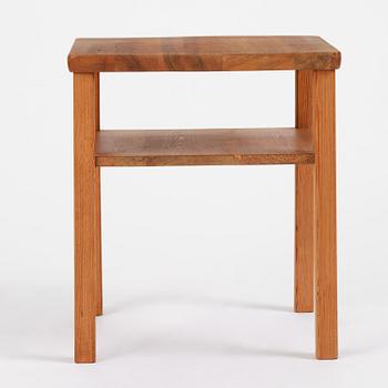 Axel Einar Hjorth, a stained pine "Värmdö" table, Nordiska Kompaniet, Sweden, 1930s.