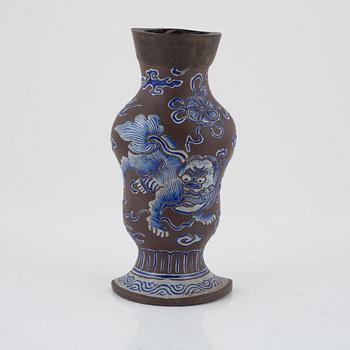 A Yixing ware wall vase and a spoon, Qing dynasty, 19th Century.