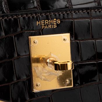 Hermès, A brown Alligator Mississippiensis "Kelly 28", 1964.