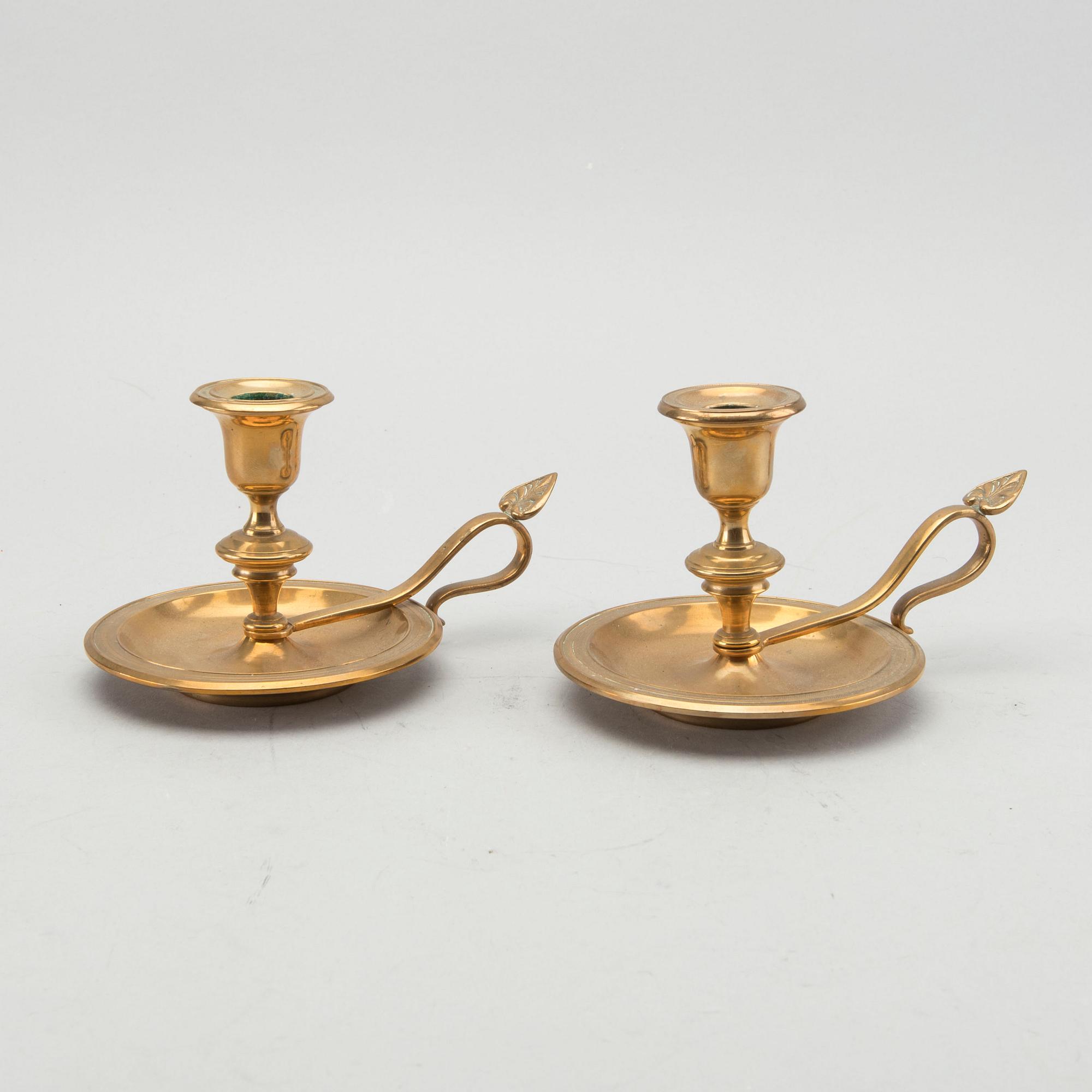 A pair of Gusum brass candelsticks.