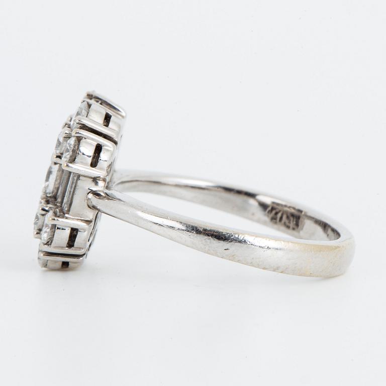 A ca 1.20 cts brilliant- princess- and baguette-cut diamond ring.