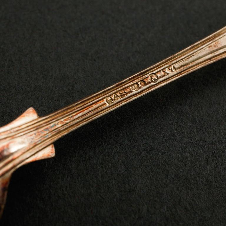 A silver set of table ware, 27 pcs, 19th and 20th century.