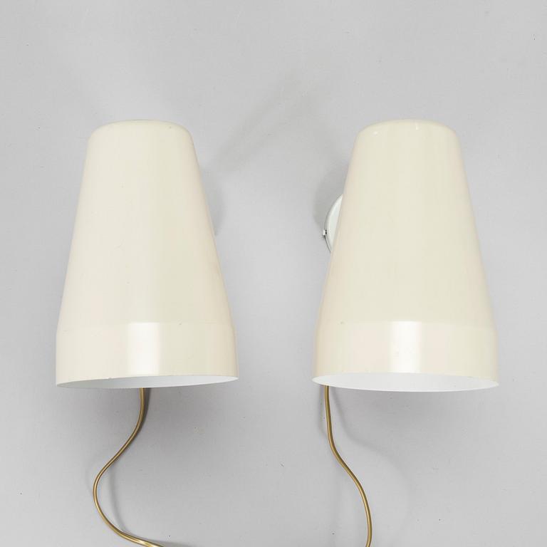 A pair of 1960s wall lights model AH 74, for Itsu.