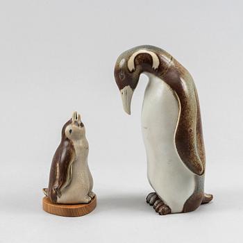 Gunnar Nylund, two stoneware figurines of penguines for Rörstrand.