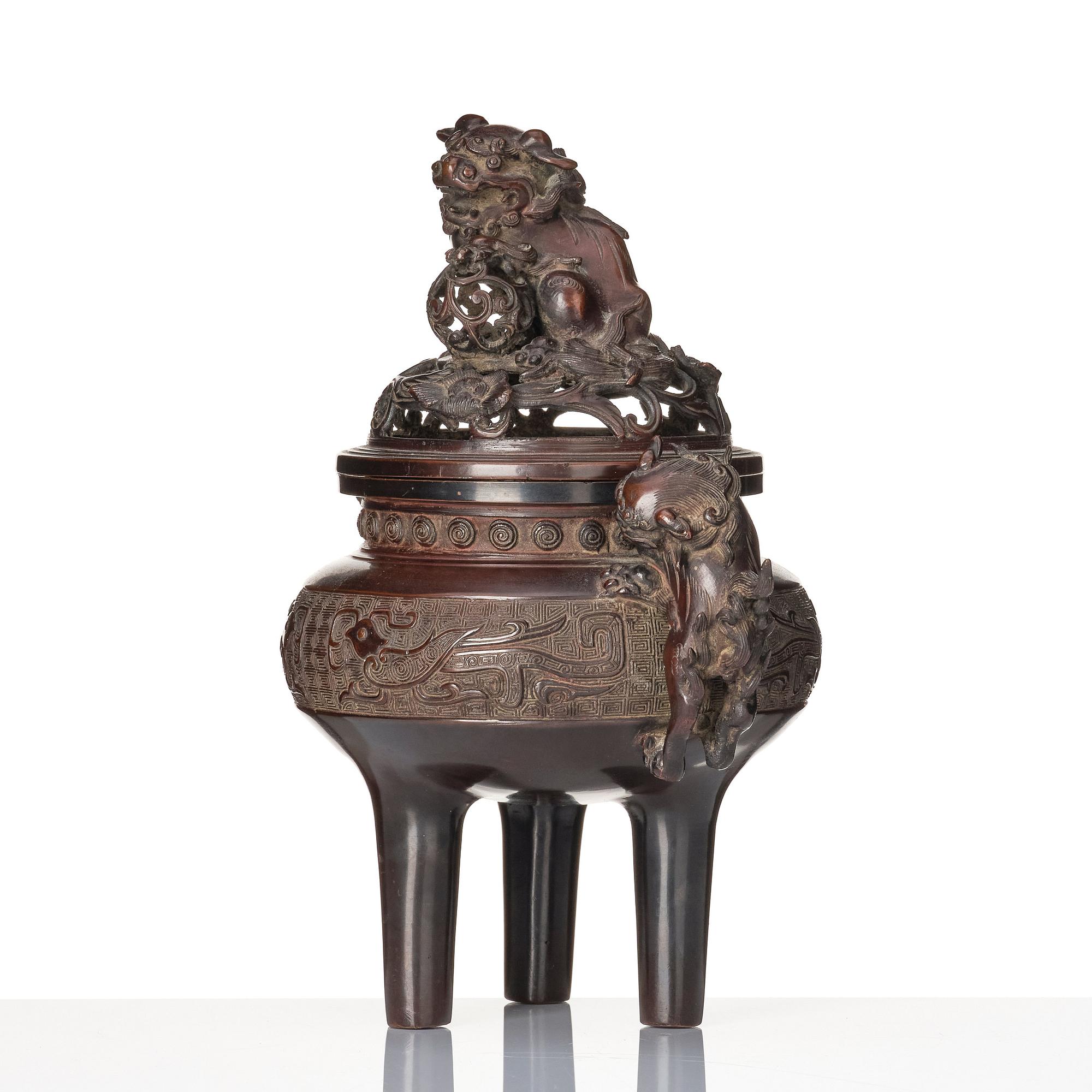 A Japanese insence burner with cover and liner, 19th Century.