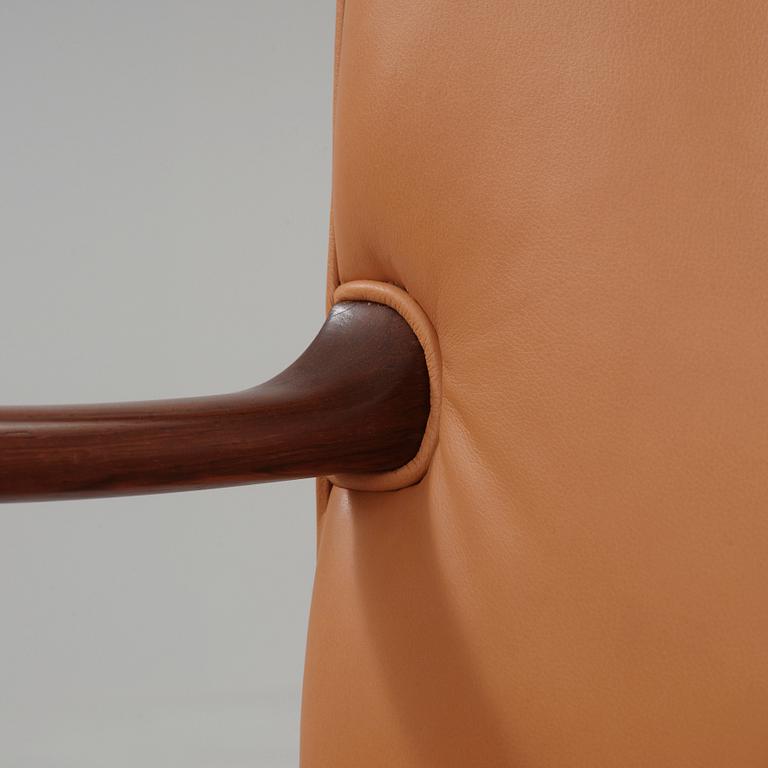 A pair of Ole Wanscher palisander armchairs, Denmark 1960's.