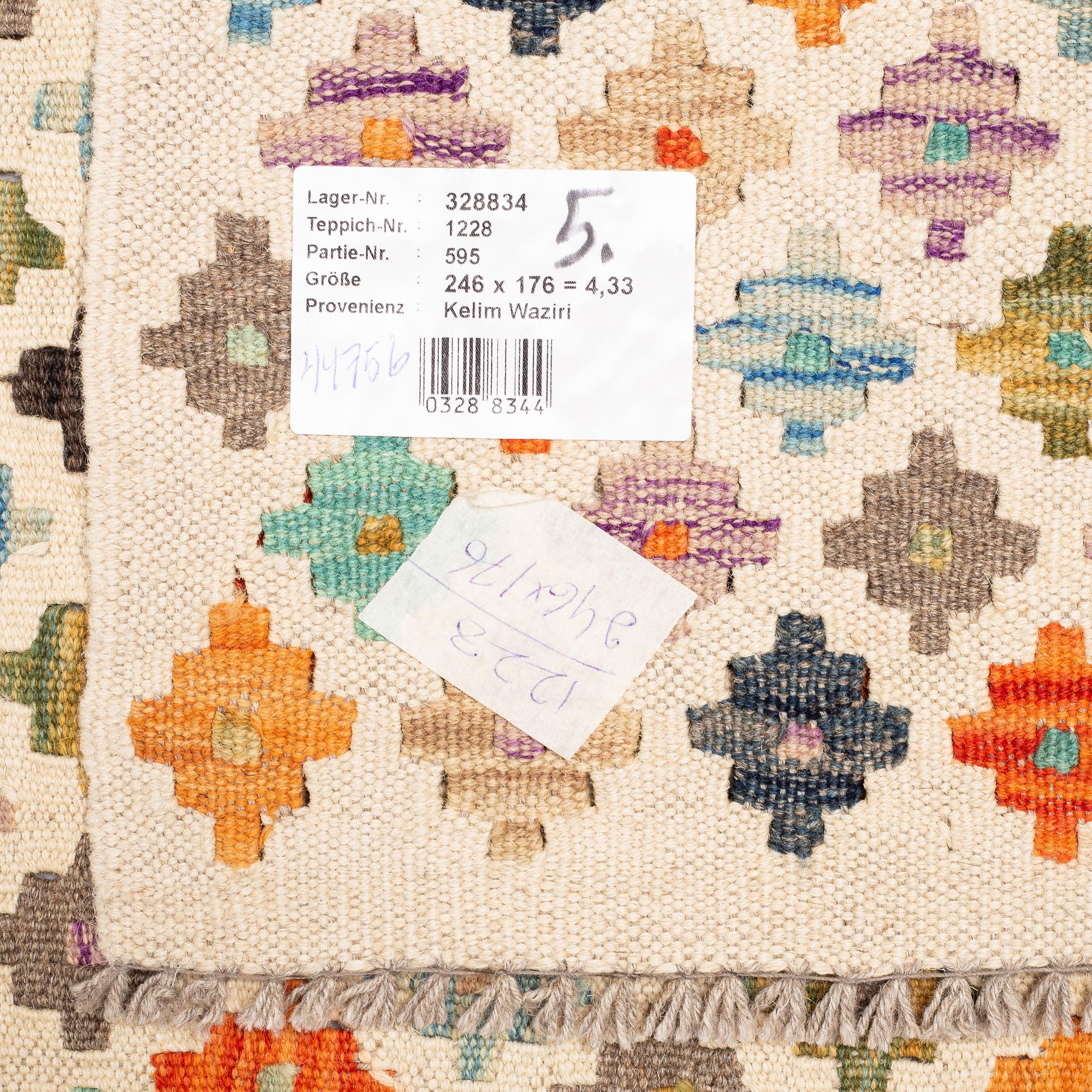 A rug, kilim, ca 246 x 176 cm.