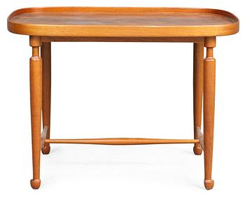 A Josef Frank mahogany table, Firma Svenskt Tenn.